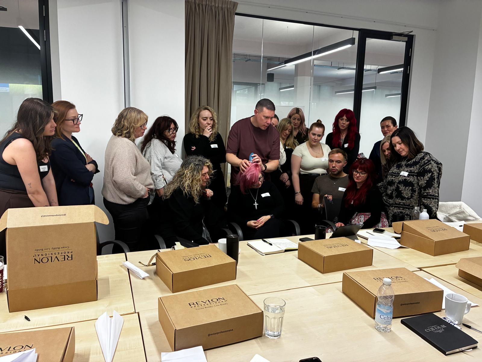 cohort examining hair through a trichocamera